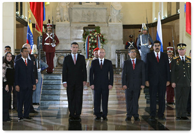 Russian Prime Minister Vladimir Putin lays a wreath at the tomb of Venezuelan Liberator Simon Bolivar in the National Pantheon of Venezuela