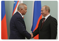 Prime Minister Vladimir Putin meets with President Karimov of Uzbekistan