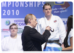 Prime Minister Vladimir Putin at the European Judo Championship, and taking part in the awards ceremony, during his working visit to the Republic of Austria|24 april, 2010|22:49