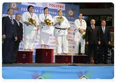 Prime Minister Vladimir Putin at the European Judo Championship, and taking part in the awards ceremony, during his working visit to the Republic of Austria|24 april, 2010|22:49