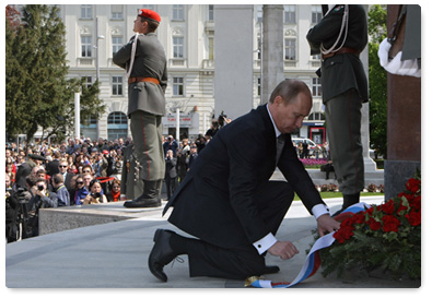 While on a working visit to Austria, Prime Minister Vladimir Putin lays a wreath at the Soviet War Memorial in Vienna and talks with World War II veterans