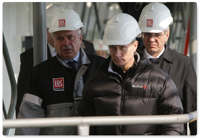 During a visit to Astrakhan, Prime Minister Vladimir Putin officially launches oil production at a fixed LUKoil platform in the Caspian Sea