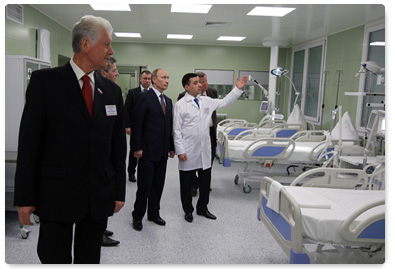 Prime Minister Vladimir Putin tours the new surgical building at the Alexandro-Mariinskaya regional hospital in Astrakhan