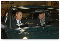 During his working trip to the Siberian Federal District, Prime Minister Vladimir Putin visits a car dealership participating in the car trade-in programme