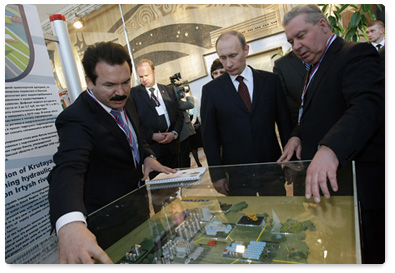 Prime Minister Vladimir Putin attends an exhibition of projects in Siberian regions