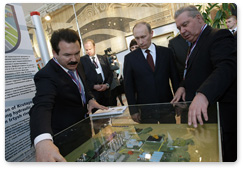 Prime Minister Vladimir Putin attends an exhibition of projects in Siberian regions