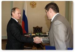 Prime Minister Vladimir Putin meets with Sergei Kostin, chairman of state company Russian Highways (Avtodor)