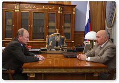 Prime Minister Vladimir Putin holds a meeting with Moscow Mayor Yuri Luzhkov