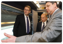 Russian Prime Minister Vladimir Putin and Finnish Prime Minister Matti Vanhanen attend the presentation of the high-speed Allegro train in Finland|27 may, 2010|16:51