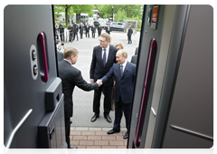 Russian Prime Minister Vladimir Putin and Finnish Prime Minister Matti Vanhanen attend the presentation of the high-speed Allegro train in Finland|27 may, 2010|16:53