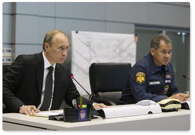 Prime Minister Vladimir Putin holds a videoconference in the Situations Room of the Ministry of Civil Defence, Emergencies and Disaster Relief to discuss the recent accident at the Raspadskaya coal mine in the Kemerovo Region