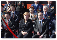 Prime Minister Vladimir Putin attends a military parade on Red Square marking the 65th anniversary of Victory in the Great Patriotic War