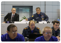 Prime Minister Vladimir Putin and Minister of Civil Defence, Emergencies, and Disaster Relief Sergei Shoigu at a videoconference in the Situations Room of the Ministry of Civil Defence, Emergencies and Disaster Relief to discuss the recent accident at the Raspadskaya coal mine in the Kemerovo Region|9 may, 2010|12:54