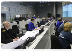 Prime Minister Vladimir Putin and Minister of Civil Defence, Emergencies, and Disaster Relief Sergei Shoigu at a videoconference in the Situations Room of the Ministry of Civil Defence, Emergencies and Disaster Relief to discuss the recent accident at the Raspadskaya coal mine in the Kemerovo Region|9 may, 2010|13:16