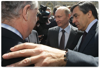 Prime Minister Vladimir Putin and Prime Minister Francois Fillon of France consider plans for a monument to the Russian Expeditionary Force that fought in France during World War I