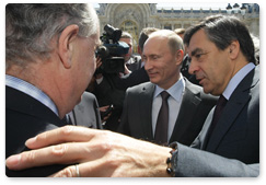 Prime Minister Vladimir Putin and Prime Minister Francois Fillon of France consider plans for a monument to the Russian Expeditionary Force that fought in France during World War I