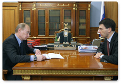 Prime Minister Vladimir Putin holds a working meeting with Minister of Communications and Mass Media Igor Shchegolev