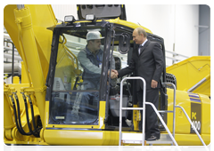 Prime Minister Vladimir Putin during his trip to the Yaroslavl Region touring a new production facility owned by leading Japanese construction equipment manufacturer Komatsu|18 june, 2010|17:35