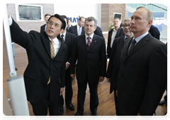 Prime Minister Vladimir Putin during his trip to the Yaroslavl Region touring a new production facility owned by leading Japanese construction equipment manufacturer Komatsu|18 june, 2010|17:35