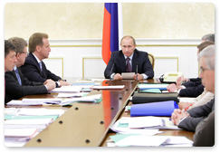 Prime Minister Vladimir Putin holds a meeting to discuss the federal budget for 2011 and the planning period of 2012-2013