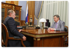 Russian Prime Minister Vladimir Putin meets with Alexander Surinov, the head of the Federal Service for State Statistics