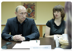 Vladimir Putin  with the families of miners and rescue workers ho were killed in the Novokuznetsk mine blasts|24 june, 2010|14:42