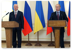 Prime Minister Vladimir Putin and Ukrainian Prime Minister Mykola Azarov hold a joint news conference following bilateral talks