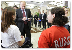 Prime Minister Vladimir Putin meets with the Russian Paralympic fencing team