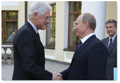 Prime Minister Vladimir Putin meets with former President of the United States Bill Clinton