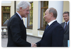 Prime Minister Vladimir Putin meets with former President of the United States Bill Clinton