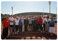 Prime Minister Vladimir Putin with athletes at Meteor stadium in Zhukovsky|30 june, 2010|18:27