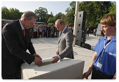 Prime Minister Vladimir Putin and President of the International Olympic Committee (IOC) Jacques Rogge take part in the foundation stone ceremony for the Russian International Olympic University