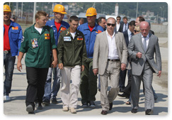 Prime Minister Vladimir Putin tours the construction sites of facilities for the 2014 Winter Olympics in Sochi