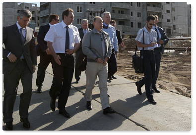 Prime Minister Vladimir Putin inspects the construction site for a residential district for servicemen in Volgograd