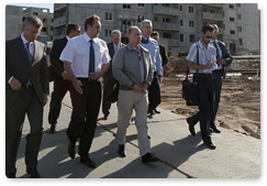 Prime Minister Vladimir Putin inspects the construction site for a residential district for servicemen in Volgograd