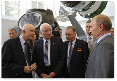 Prime Minister Vladimir Putin speaks with participants of the historic Apollo-Soyuz Test Project (ASTP)