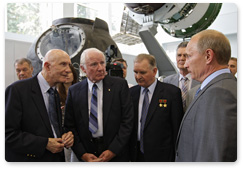 Prime Minister Vladimir Putin speaks with participants of the historic Apollo-Soyuz Test Project (ASTP)