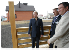 Prime Minister Vladimir Putin touring the construction site of the Solnenchny housing complex in the village of Pushkari, Tambov Region|2 july, 2010|19:33