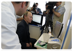 Prime Minister Vladimir Putin visiting a community centre in the village of Tulinovka, Tambov Region|2 july, 2010|20:02