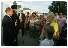 Prime Minister Vladimir Putin visiting a church in the village of Tulinovka|2 july, 2010|21:08