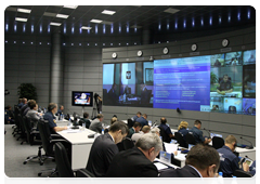 Prime Minister Vladimir Putin during a conference call on measures to reduce the incidence of wildfires|27 july, 2010|17:13