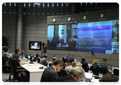 Prime Minister Vladimir Putin during a conference call on measures to reduce the incidence of wildfires|27 july, 2010|17:13