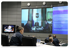 Prime Minister Vladimir Putin during a conference call on measures to reduce the incidence of wildfires|27 july, 2010|17:13