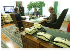 Prime Minister Vladimir Putin during a conference call on measures to reduce the incidence of wildfires|27 july, 2010|19:42