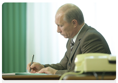 Prime Minister Vladimir Putin during a conference call on measures to reduce the incidence of wildfires|27 july, 2010|19:43