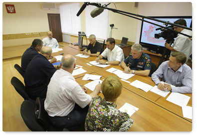 Prime Minister Vladimir Putin chairs a meeting on the nationwide wildfire emergency while visiting the Nizhny Novgorod Region