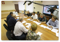 Prime Minister Vladimir Putin chairs a meeting on the nationwide wildfire emergency while visiting the Nizhny Novgorod Region