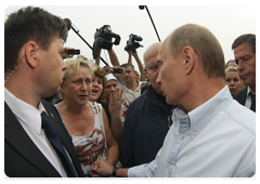 Following the meeting, Vladimir Putin spoke with residents of the town and surrounding villages that were affected by forest fires, and explained to them what was discussed at the meeting|30 july, 2010|13:34