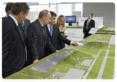 Prime Minister Vladimir Putin inspecting plans for airport construction and renovation during his visit to North Caucasus Federal District|7 july, 2010|16:14