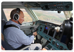 Prime Minister Vladimir Putin helping extinguish forest fires from aboard a Be-200 amphibious aircraft|10 august, 2010|18:10